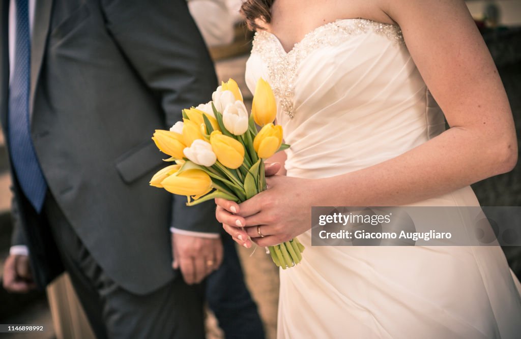 Bride bouquet with tulips for a weeding ceremony. Italy