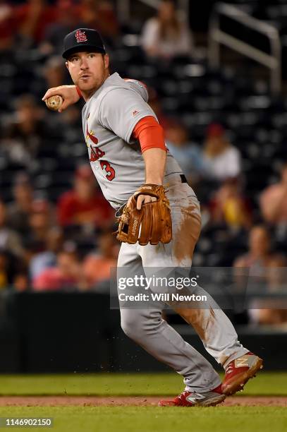 Jedd Gyorko of the St. Louis Cardinals throws to first base to get out Brian Dozier of the Washington Nationals during the sixth inning at Nationals...