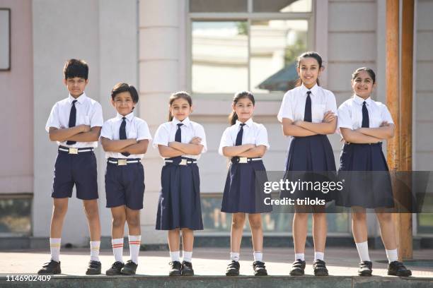 school children standing in campus - indian boy standing stock pictures, royalty-free photos & images