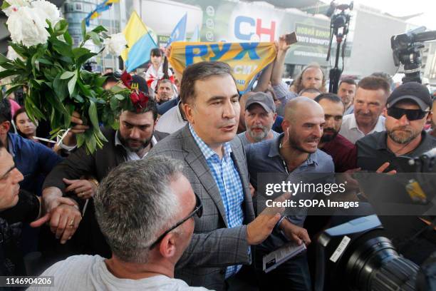 Former Georgian president Mikheil Saakashvili is seen speaking after arriving at the International Airport Boryspil not so far from Kiev. New...