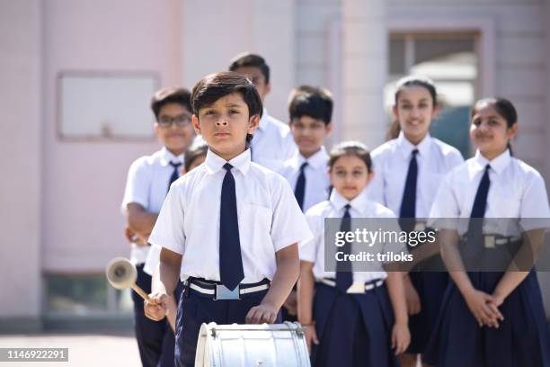 marching band in school assembly - school-assembly-hall stock pictures, royalty-free photos & images