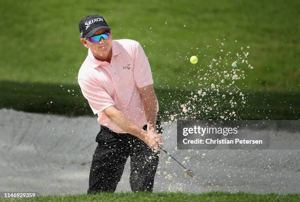 Kent Jones chips from the bunker onto the first green during the continuation round one of the Insperity Invitational at The Woodlands Country Club...