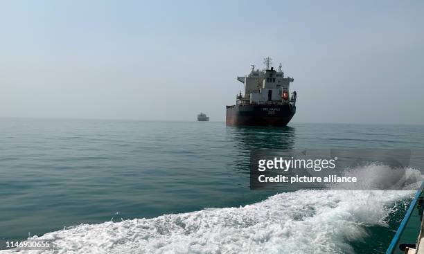 Iranian oil and cargo ships in the Persian Gulf in front of the Strait of Hormus. Almost a third of the world's oil exports are shipped through the...