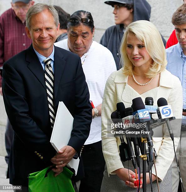 Elizabeth Smart and her father Ed Smart talk to the press outside of federal court after the sentencing of Elizabeths kidnapper Brian David Mitchell...