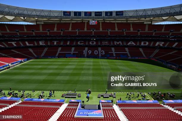 Journalists and officials visit the Wanda Metropolitan Stadium in Madrid on May 30, 2019 ahead of the UEFA Champions League final football match...