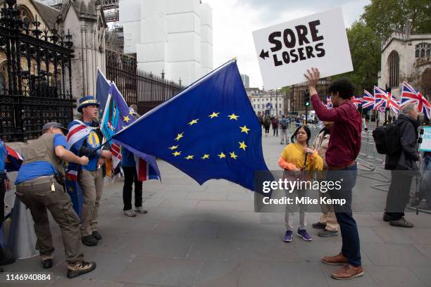 Anti Brexit and pro Brexit protest proclaiming that they are sore losers in Westminster on 7th May 2019 in London, England, United Kingdom.