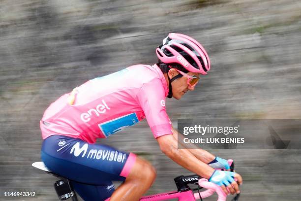 Team Movistar rider Ecuador's Richard Carapaz, with the pink jersey of overall leader, takes part in stage eighteen of the 102nd Giro d'Italia - Tour...