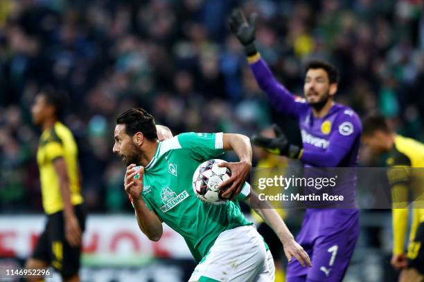 Claudio Pizarro of SV Werder Bremen celebrates after scoring his sides second goal during the Bundesliga match between SV Werder Bremen and Borussia...