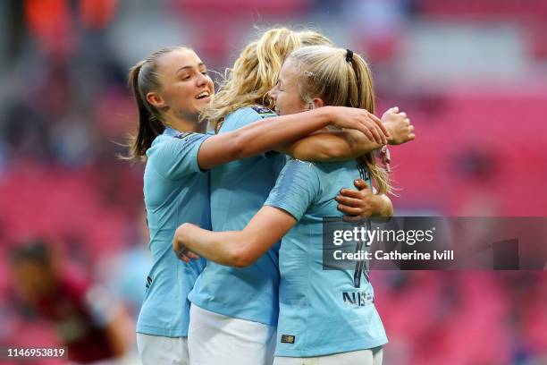 Lauren Hemp of Manchester City Women celebrates with teammates after scoring his team's third goal during the Women's FA Cup Final match between...