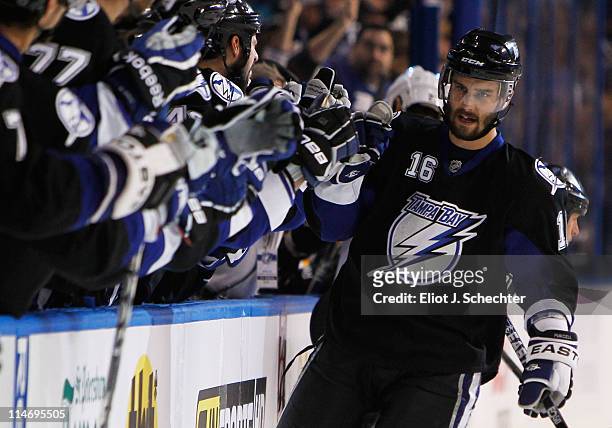 Teddy Purcell of the Tampa Bay Lightning celebrates his first period goal with teammates in Game Six of the Eastern Conference Finals against the...