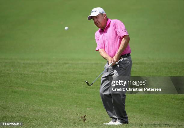 Billy Mayfair chips onto the first green during the continuation round one of the Insperity Invitational at The Woodlands Country Club on May 04,...
