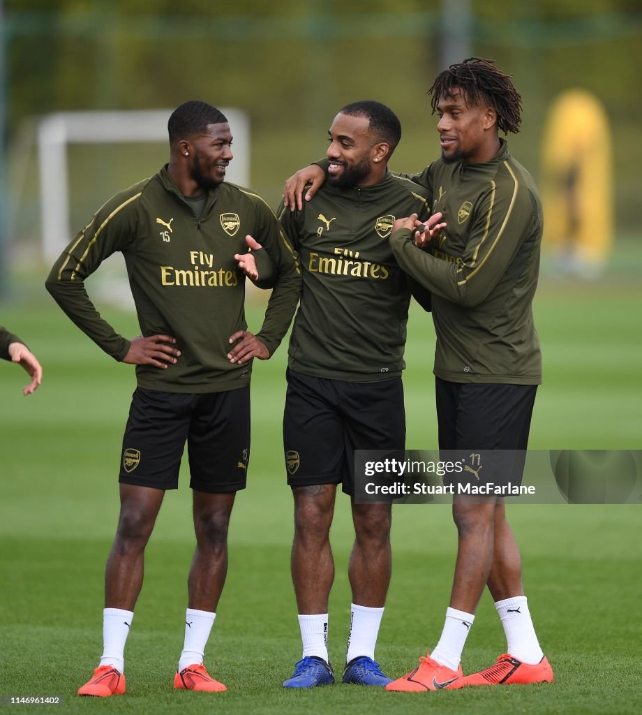 Ainsley Maitland-Niles, Alex Lacazette and Alex Iwobi of Arsenal