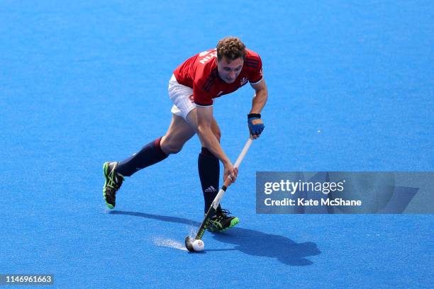 Harry Martin of Great Britain runs with the ball during the Men's FIH Field Hockey Pro League match between Great Britain and Spain at Lee Valley...