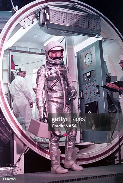 Astronaut John Glenn prepares to enter the Mercury launch vehicle February 20, 1962 at Cape Canaveral, FL.