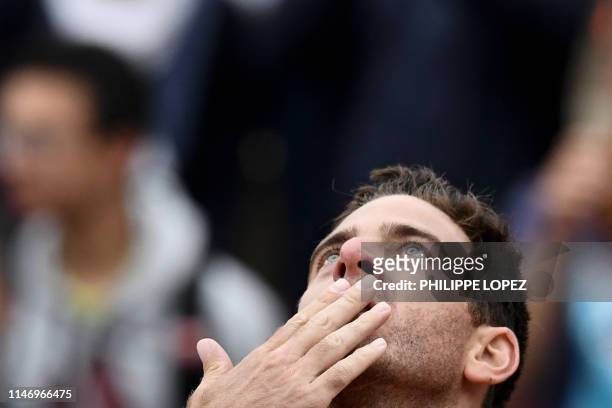 Argentina's Juan Martin del Potro blows a kiss as he celebrates after winning against Japan's Yoshihito Nishioka during their men's singles second...