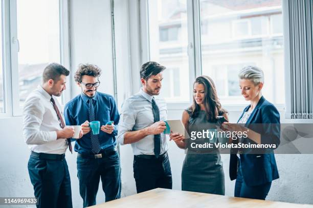 creative group of people having a break in the office - office romance stock pictures, royalty-free photos & images