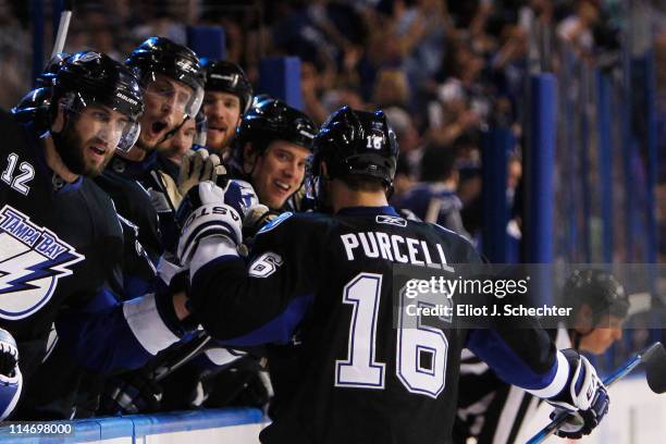 Teddy Purcell of the Tampa Bay Lightning celebrates his second period goal with teammates in Game Six of the Eastern Conference Finals against the...