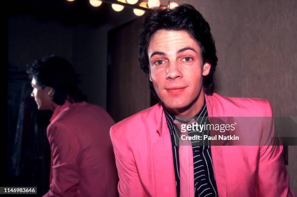 Portrait of American Rock musician Rick Springfield as he poses backstage at the Mill Run Theater, Niles, Illinois, September 6, 1981.