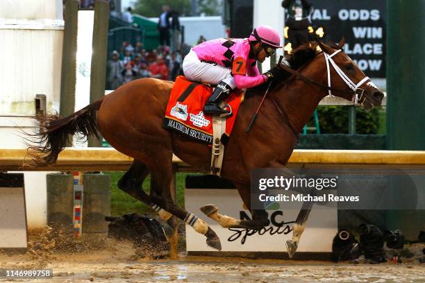 Maximum Security, ridden by jockey Luis Saez crosses the finish line during 145th running of the Kentucky Derby at Churchill Downs on May 04, 2019 in...