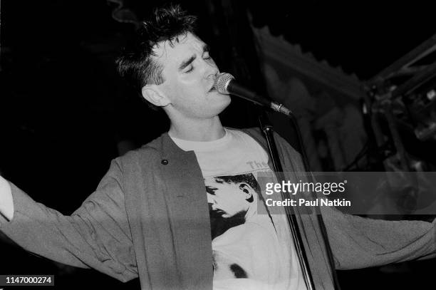 English Rock and Pop singer Morrissey , of group the Smiths, performs onstage at the Aragon Ballroom, Chicago, Illinois, June 7, 1985. The tour was...
