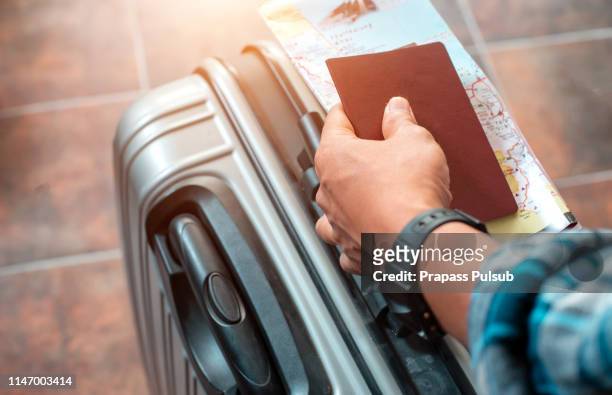 travel bags and passport flight travel traveller - koffer stockfoto's en -beelden