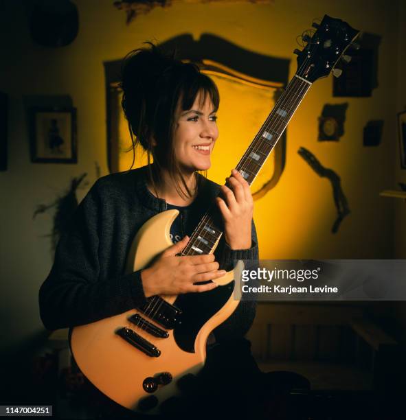 Singer-songwriter Juliana Hatfield poses for a portrait with her guitar on May 20, 1993 in New York City, New York.