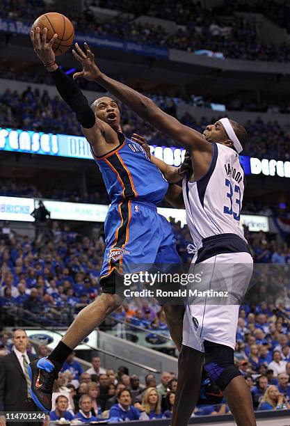 Russell Westbrook of the Oklahoma City Thunder goes up for a shot against Brendan Haywood of the Dallas Mavericks in the second half in Game Five of...