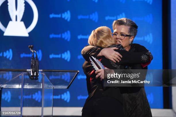 Madonna and Rosie O'Donnell embrace on stage during the 30th Annual GLAAD Media Awards New York at New York Hilton Midtown on May 04, 2019 in New...