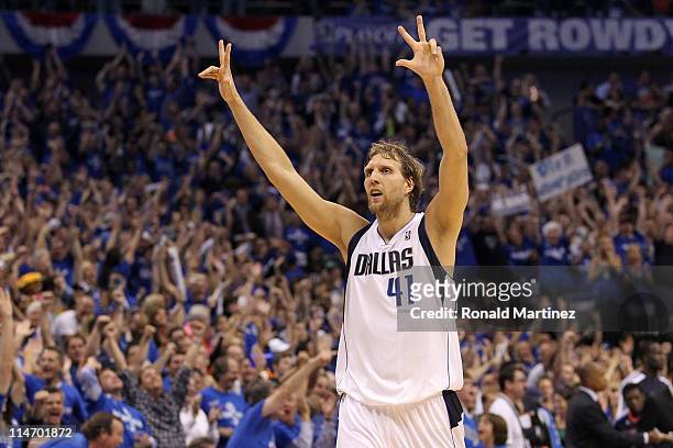 Dirk Nowitzki of the Dallas Mavericks reacts after making a three-pointer in the fourth quarter while taking on the Oklahoma City Thunder in Game...