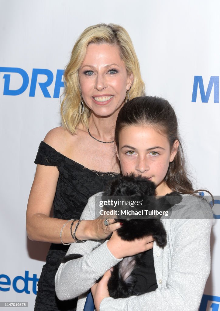 Juliet Rody Robyn Sidoti and Juliet Sidoti pose with a puppy at JDRF's annual ...