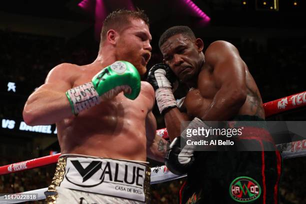 Canelo Alvarez punches Daniel Jacobs during their middleweight unification fight at T-Mobile Arena on May 04, 2019 in Las Vegas, Nevada.