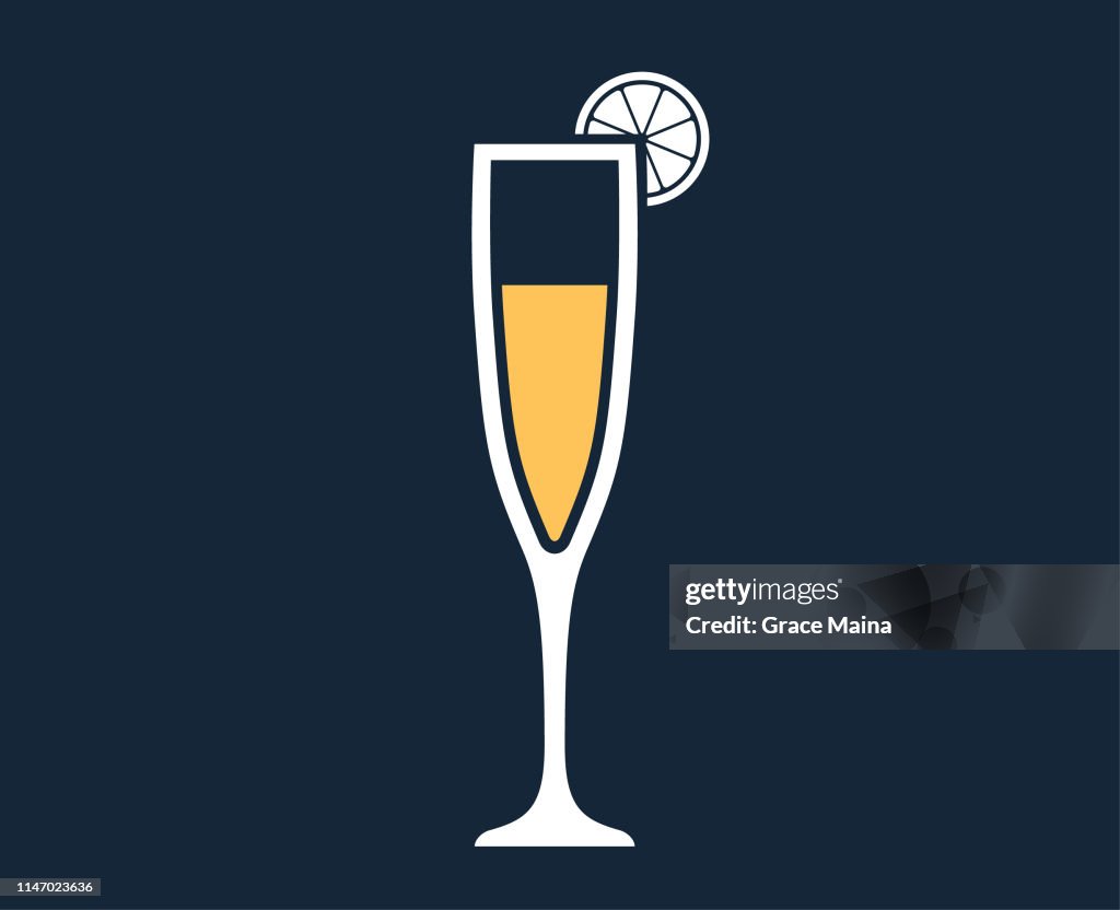 Champagne In Champagne Flute Glass With Lemon Or Orange Garnish