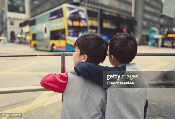 children travel in hongkong - taxi boys stock pictures, royalty-free photos & images