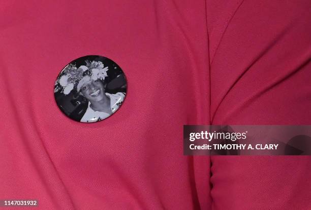 Man wears a button with a picture of transgender activist Marsha P. Johnson during an event at the The Lesbian, Gay, Bisexual & Transgender Community...