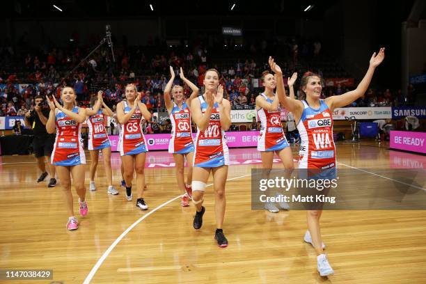 The Swifts celebrate victory during the round two Super Netball match between the Sydney Swifts and the Adelaide Thunderbirds at Quay Centre on May...