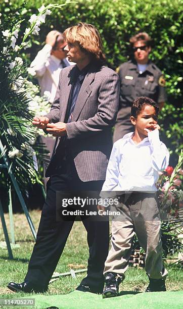 Kato Kaelin, O.J. Simpson's house guest, and Justin Simpson, Simpson's son attend the internment of Simpson's ex-wife nicole Brown Simpson June 16,...