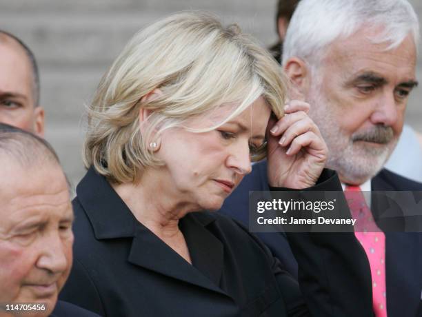 Martha Stewart and her defense team, including attorney Robert Morvillo outside the US District Courthouse on Friday, July 16, 2004 in New York City....