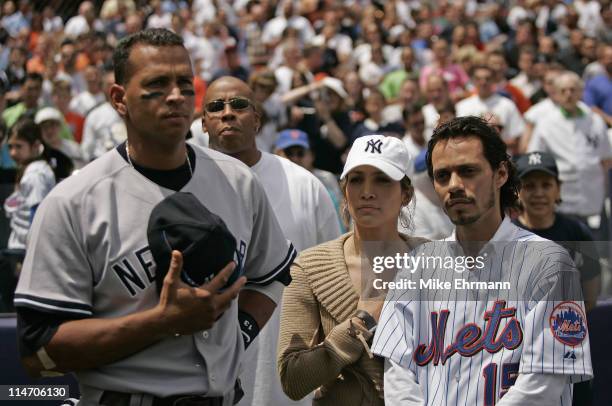 Actress Jennifer Lopez and husband Marc Anthony with New York Yankee Alex Rodriguez before a subway series game between the New York Mets and the New...