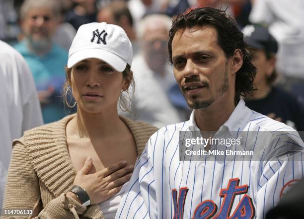 Actress Jennifer Lopez and husband Marc Anthony attend a subway series game between the New York Mets and the New York Yankees at Shea Stadium in...