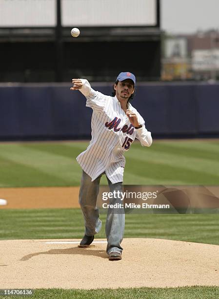 Singer Marc Anthony throws out the first pitch before a subway series game between the New York Mets and the New York Yankees at Shea Stadium in...