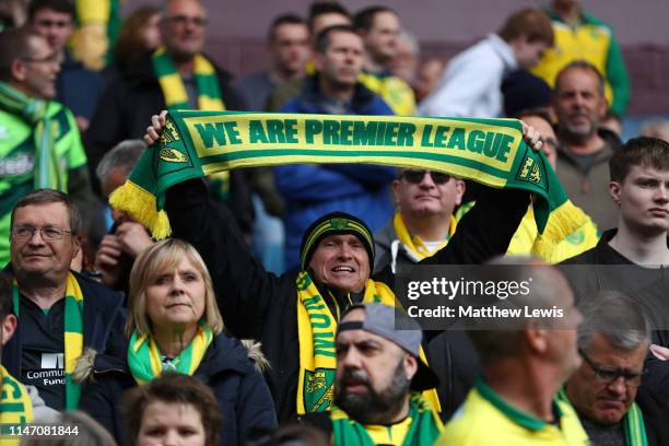 Norwich City fans welcome their team during the Sky Bet Championship match between Aston Villa and Norwich City at Villa Park on May 05, 2019 in...