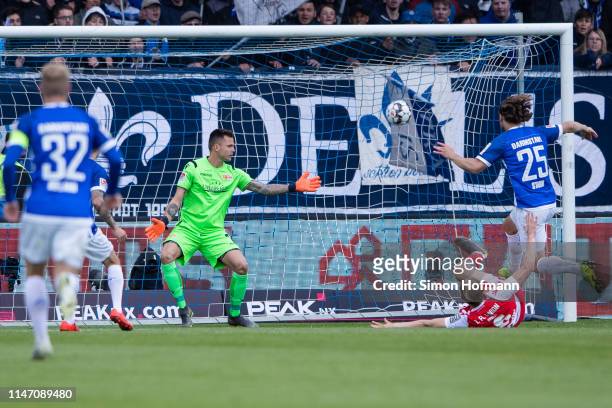 Yannick Stark of Darmstadt scores his team's first goal past Goalkeeper Rafal Gikiewicz of Berlin during the Second Bundesliga match between SV...