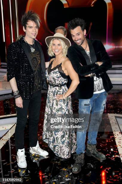 Swiss singer Beatrice Egli with Christian Ehrlich and and Andreas Ehrlich during the television show 'Willkommen bei Carmen Nebel' at Velodrom on May...