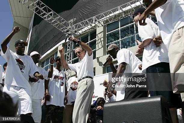 Miami Heat players and coach Pat Riley dance to celebrate during the victory parade and celebration at American Airlines Arena on June 23, 2006 in...