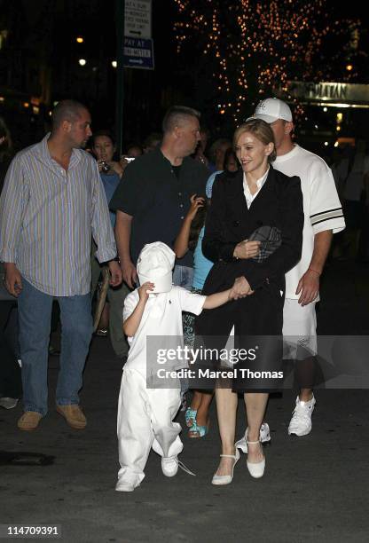 Rocco Ritchie, Madonna and Guy Ritchie during Madonna and Family Leave Kabbalah Center in New York - June 30, 2006 at Kabbalah Center in New York,...