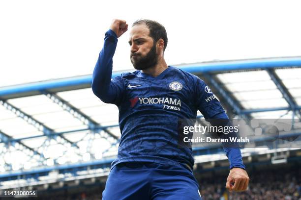 Gonzalo Higuain of Chelsea celebrates as as he scores his team's third goal during the Premier League match between Chelsea FC and Watford FC at...