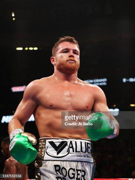Canelo Alvarez heads back to his corner during his unanimous decision win over Daniel Jacobs in their middleweight unification fight at T-Mobile...
