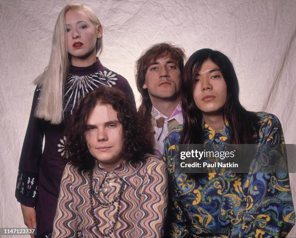 Portrait of the members of American Rock group Smashing Pumpkins as they pose in a photo studio, Chicago, Illinois, May 10, 1991. Pictures are, from...