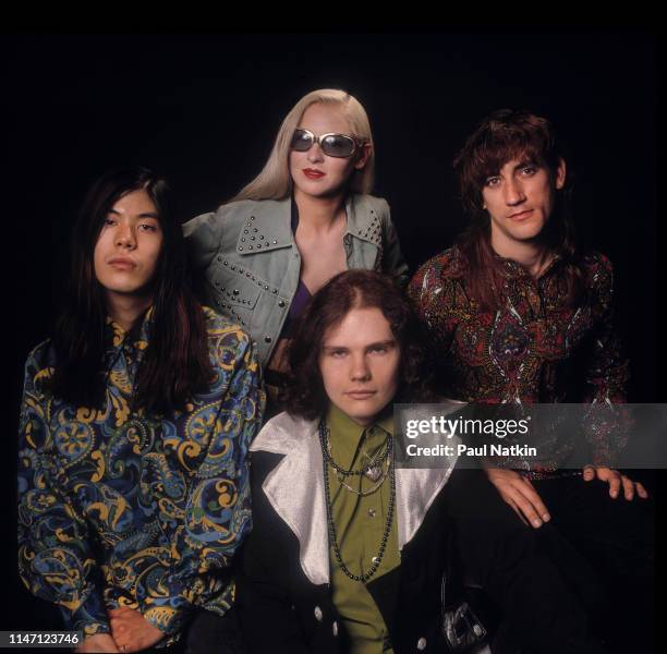 Portrait of the members of American Rock group Smashing Pumpkins as they pose in a photo studio, Chicago, Illinois, May 10, 1991. Pictures are,...