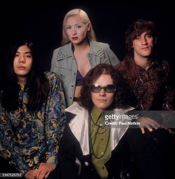 Portrait of the members of American Rock group Smashing Pumpkins as they pose in a photo studio, Chicago, Illinois, May 10, 1991. Pictures are,...